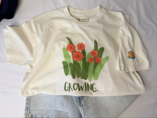 Growing. Tee