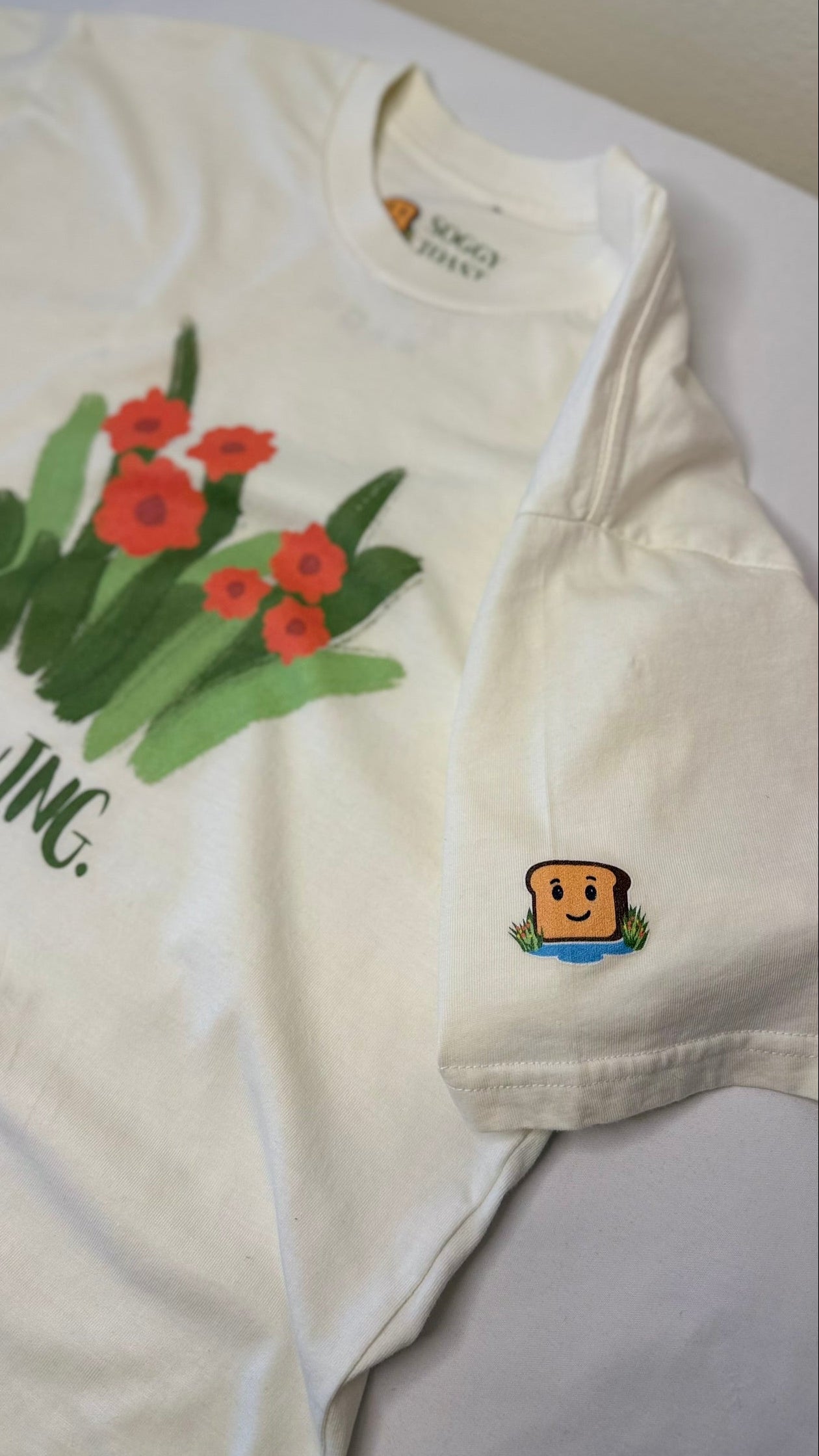 Growing. Tee